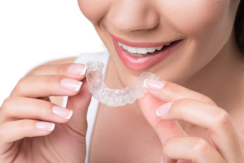 lady with invisalign
